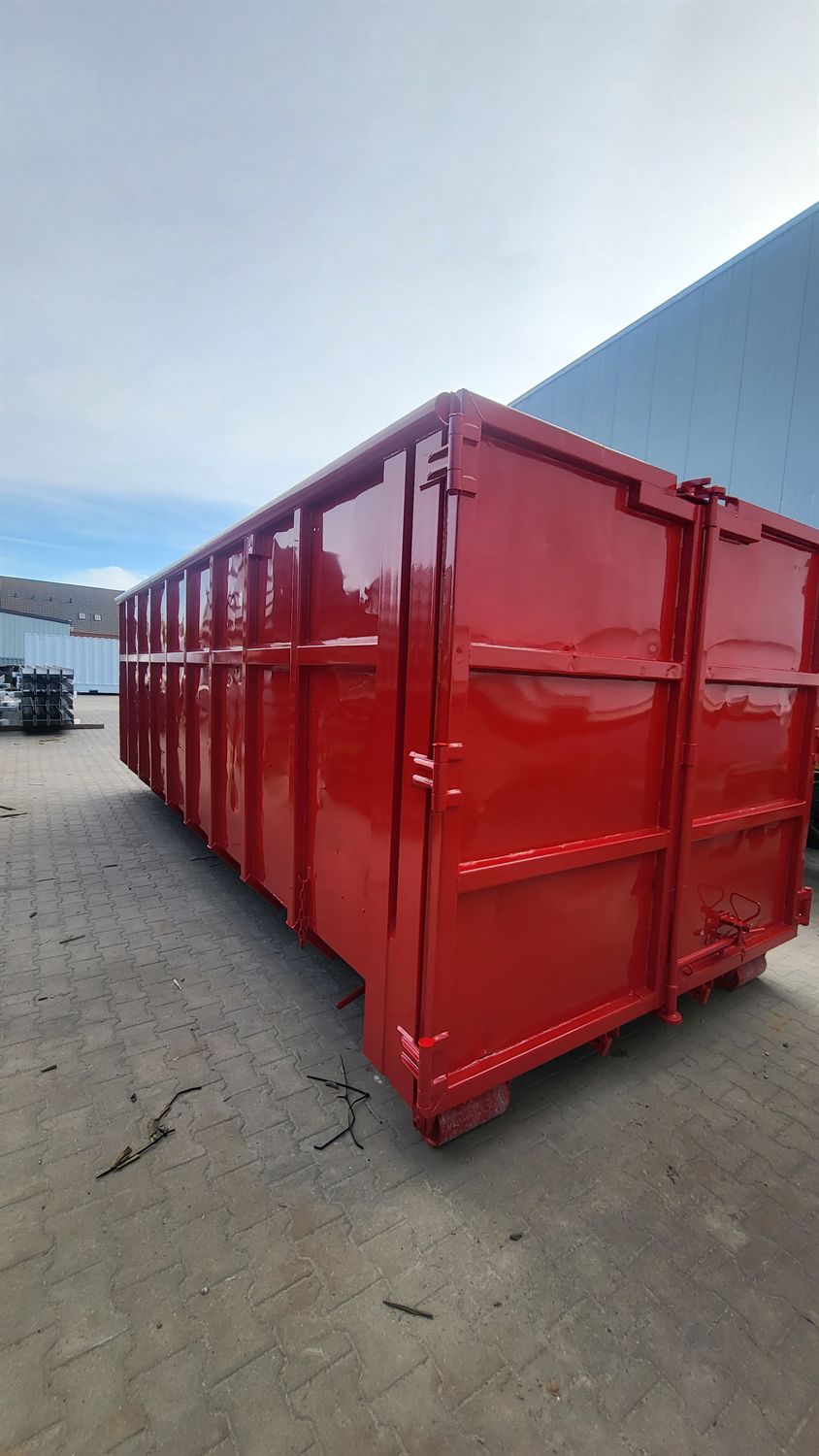 Rot pulverbeschichteter Abrollcontainer